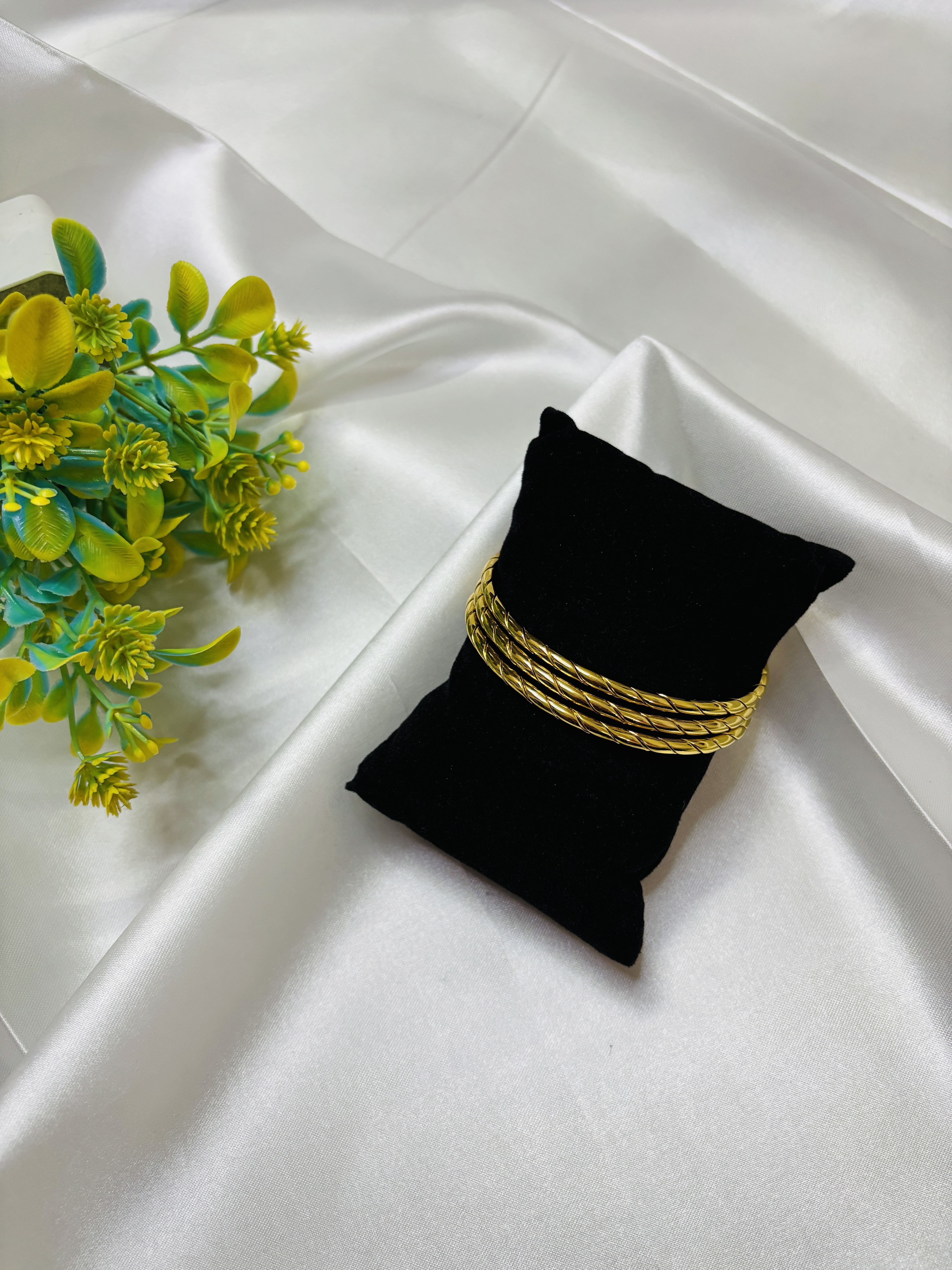    Golden Twist Bangles