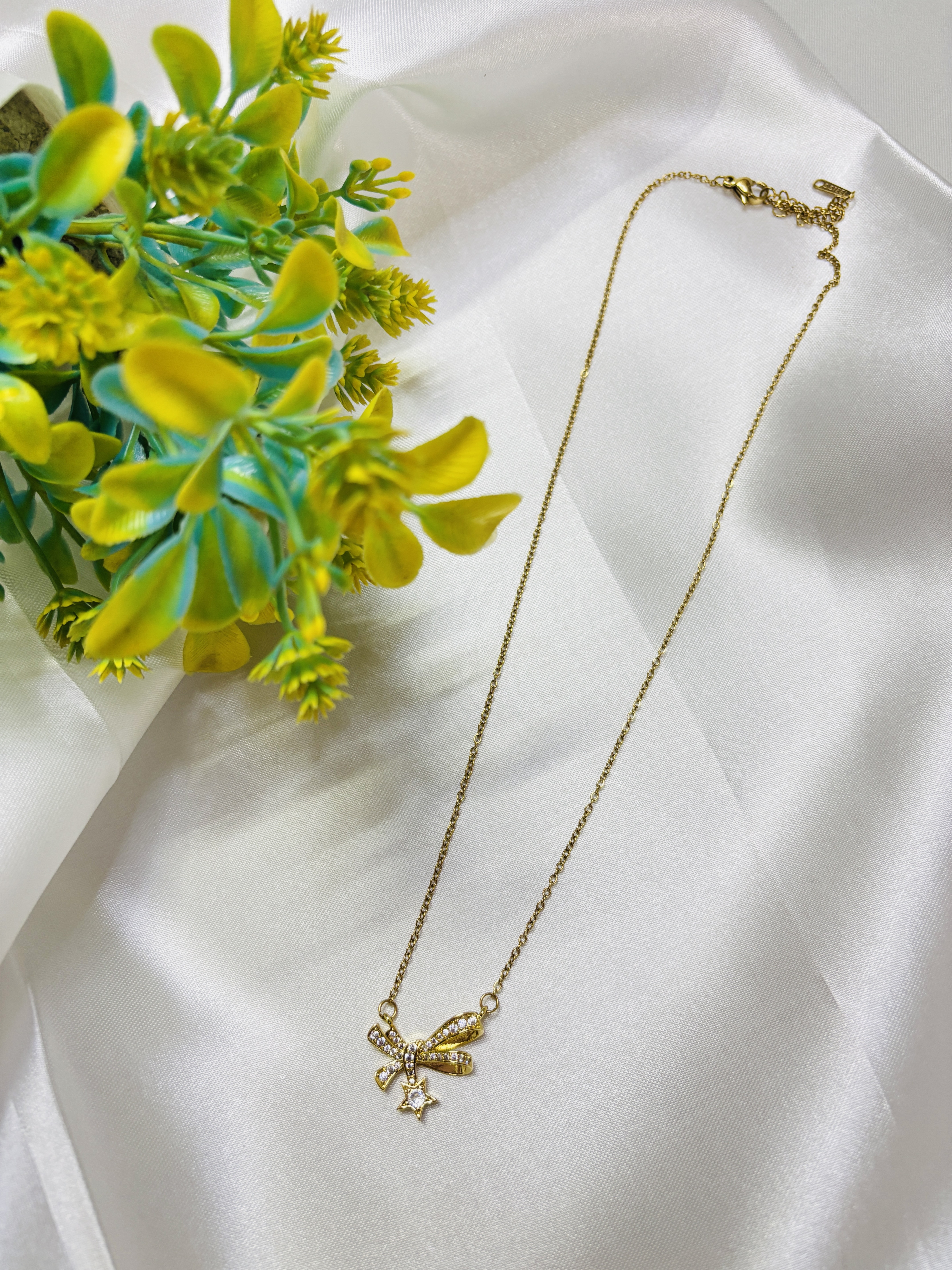 Crystal Bow Charm Necklace